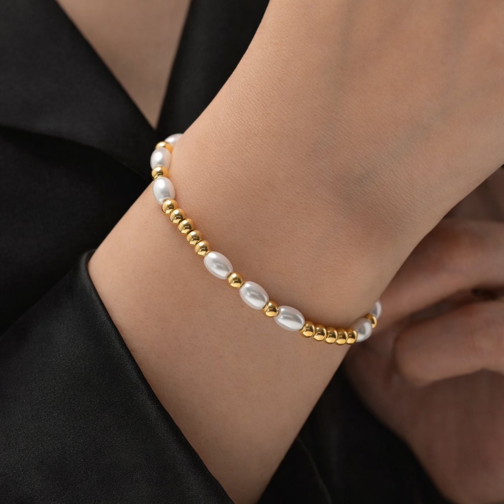 witte parel armband goudkleurig